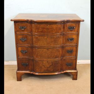 Antique Walnut Shaped Front Chest of Drawers
