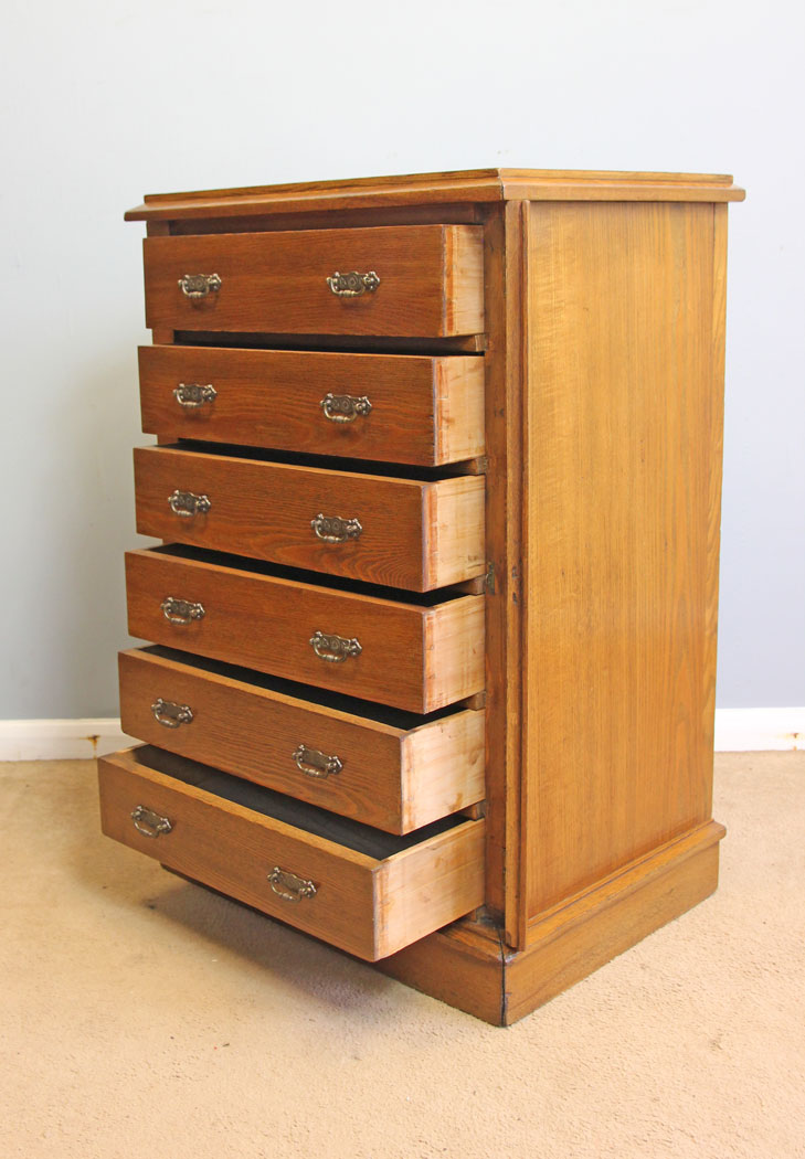 12256r11 Antique Ash Wellington Chest Drawers,
